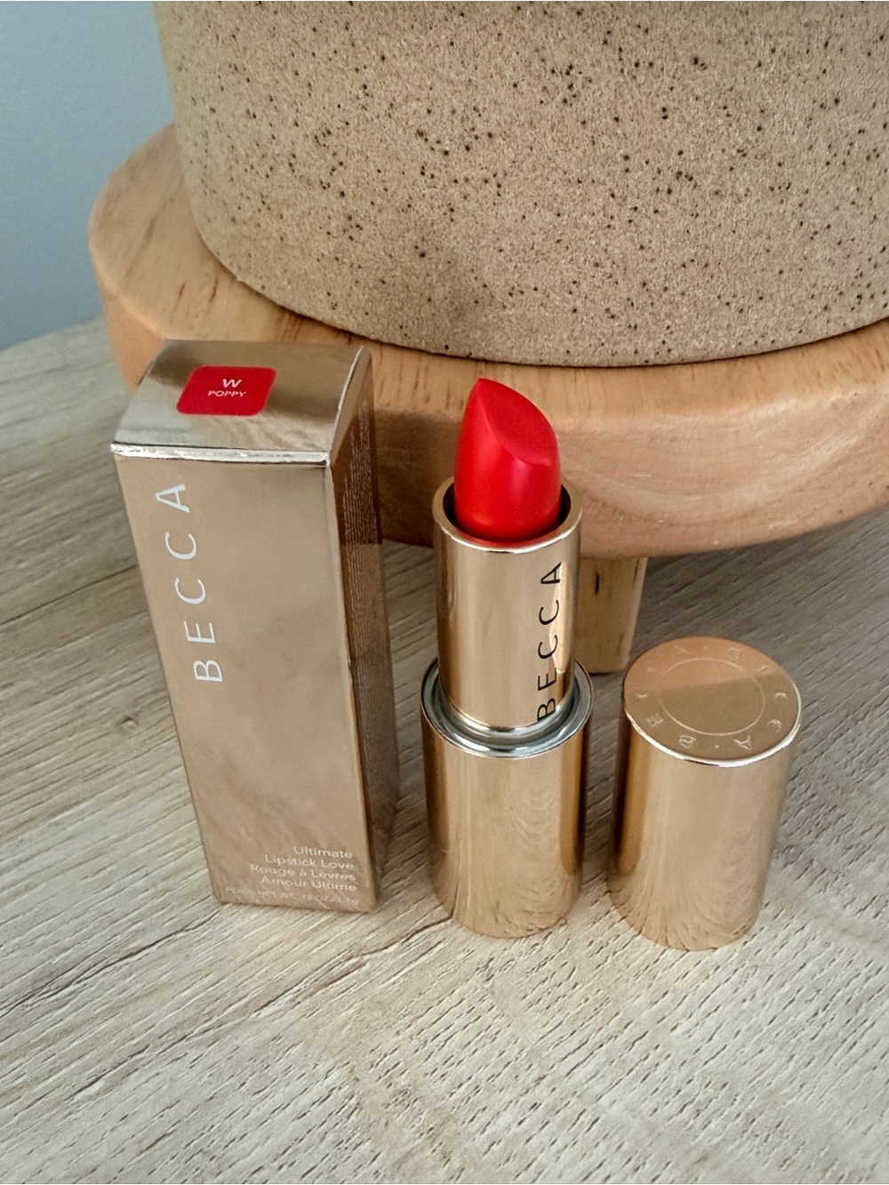 BECCA Poppy Red Hydrating Lipstick in Gold Tube Shade: Poppy